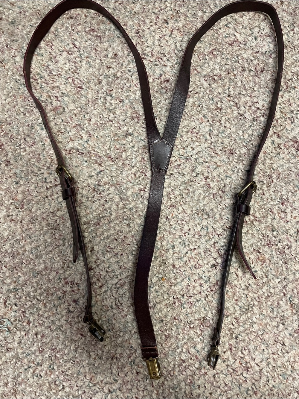 Genuine leather with brass clip suspenders and adjustable length via buckle